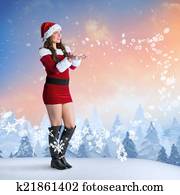 Composite image of pretty woman in santa costume holding hand out