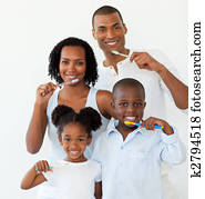 Afro-american family brushing their teeth