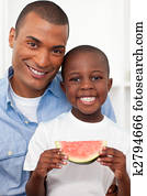 Cute father eating with his chil