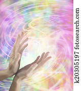 Healing hands and energy swirls