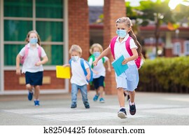 Kids on first school day after quarantine. Kids on first school day after quarantine.