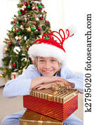 Portrait of a smiling boy wearing a Christmas hat
