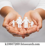 womans hands with paper man family womans hands with paper man family