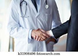 doctor handshake with a patient
