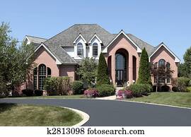 Luxury brick home with cedar roof Luxury brick home with cedar roof