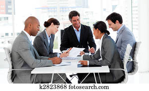 Business group showing ethnic diversity in a meeting Business group showing ethnic diversity in a meeting