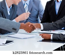 Close-up of business people greeting each other Close-up of business people greeting each other