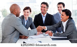 Multi-ethnic business people greeting each other