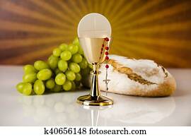 Eucharist symbol of bread and wine, chalice and host, First communion background Eucharist symbol of bread and wine, chalice and host, First communion background