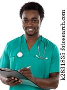 Young black doctor writing