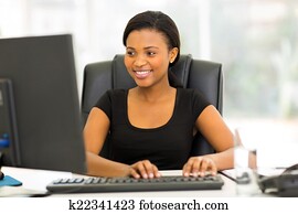 african businesswoman using computer african businesswoman using computer
