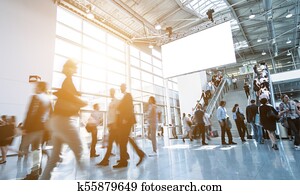 Blurred business people at a trade fair Blurred business people at a trade fair