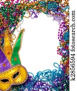 Border made of mardi gras bead and mask on white 