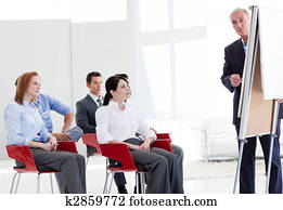 Multi-ethnic business people at a seminar Multi-ethnic business people at a seminar