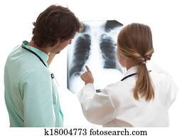 Resident explaining to intern lungs disease