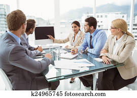 Business people in board room