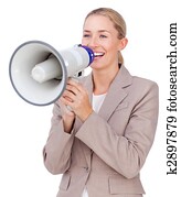 Attractive businesswoman shouting through a megaphone 