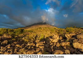 Clouds over the volcanic mountain 
