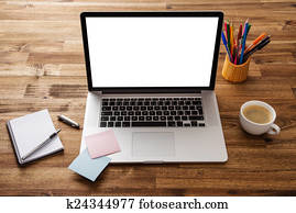 Office workplace with wooden desk.