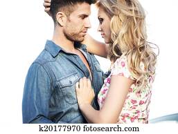 Romantic scene of the kissing couple Romantic scene of the kissing couple