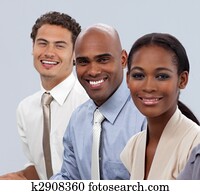 Smiling multi-ethnic business people in a line Smiling multi-ethnic business people in a line