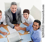 Two smiling business people greeting each other Two smiling business people greeting each other