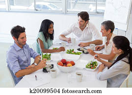 Business people eating lunch togeth Business people eating lunch togeth