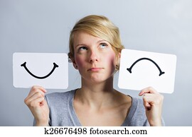 Portrait of a Person Holding Happy and Unhappy Mood Board