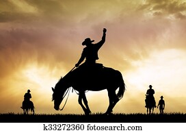 rodeo cowboy silhouette at sunset rodeo cowboy silhouette at sunset