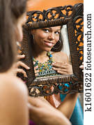 Woman in mirror.
