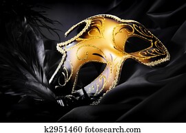 Carnival mask on black silk background Carnival mask on black silk background