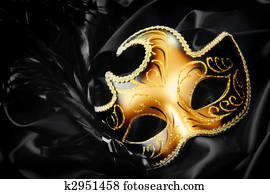 Carnival mask on black silk background Carnival mask on black silk background