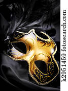 Carnival mask on black silk background Carnival mask on black silk background