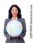 Visionary young businesswoman smiling at global business 