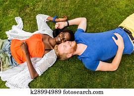 Multiracial couple in the park