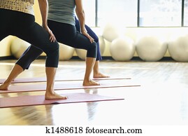 Women in yoga class. Women in yoga class.
