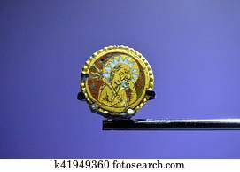 Old brooch representing an angel Old brooch representing an angel