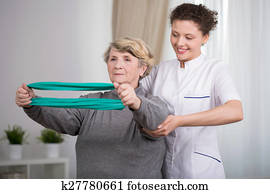 Exercising elderly woman
