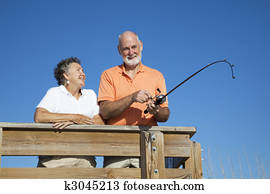 pareja mayor, viaje de la pesca