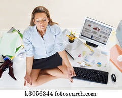 businesswoman doing yoga