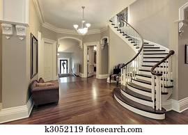 Foyer with curved staircase Foyer with curved staircase