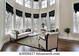 Living room with curved windows Living room with curved windows