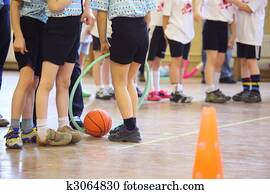 Children's feet in sports hall