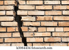 cracked brick wall cracked brick wall