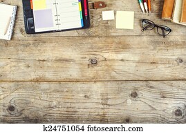 Desktop mix on a wooden office table.