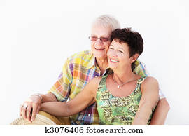 Mature couple smiling and embracing Mature couple smiling and embracing