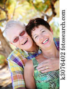 Mature couple smiling and embracing Mature couple smiling and embracing