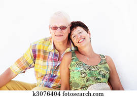 Mature couple smiling and embracing Mature couple smiling and embracing