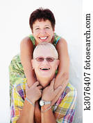 Mature couple smiling and embracing