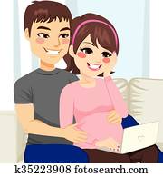 Pregnant Couple Sofa Laptop Pregnant Couple Sofa Laptop